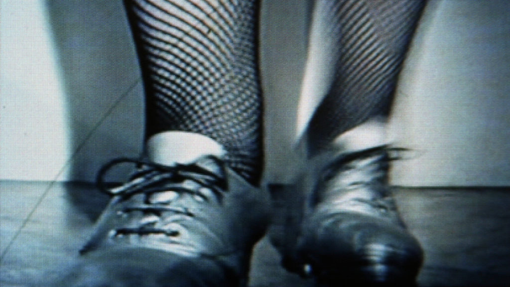 Chain Smoker, Tap Dancer. 1995. Two-channel looped video with sound. Photo: Iain Forsyth & Jane Pollard