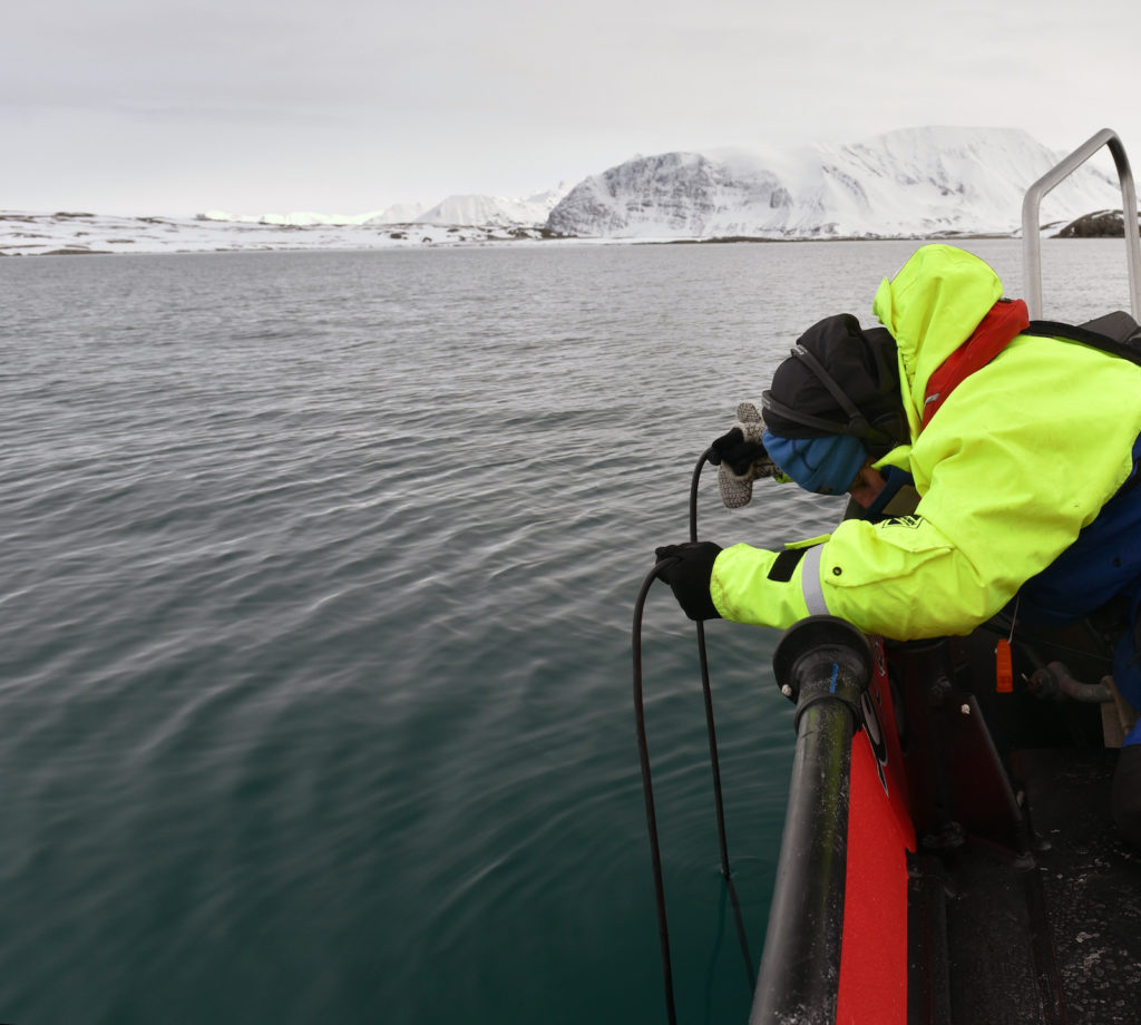 Jana Winderen hydrophone recording by Spitsbergen, Barents Sea, for the project Spring Bloom in the Marginal Ice Zone, 2016. Photo: Crew member on Helmer Hansen research vessel.