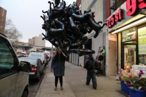 42 Black Panther Balloons on 125th Street. 2014. Video (sound, color). Image courtesy the artist and Bridget Donahue Gallery. © the artist. 